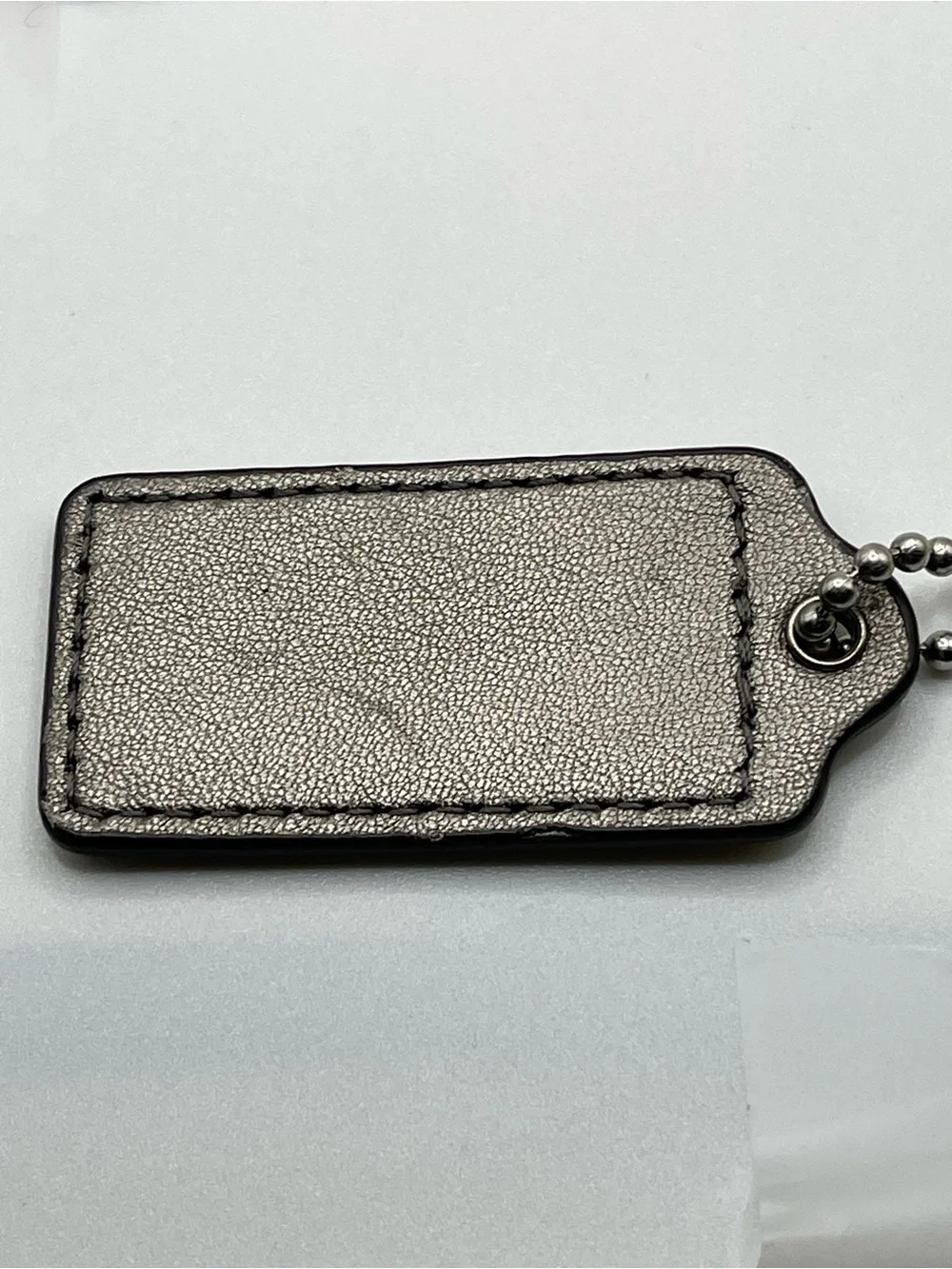 Coach iridescent dark